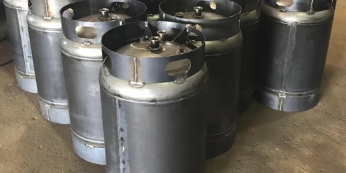 set of tanks lined up on floor